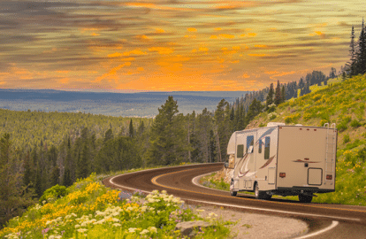 RV Driving Down a Winding Road