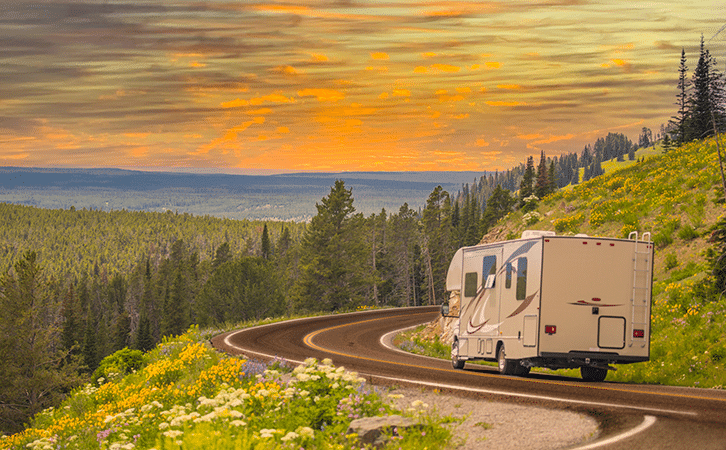 RV Driving Down a Winding Road